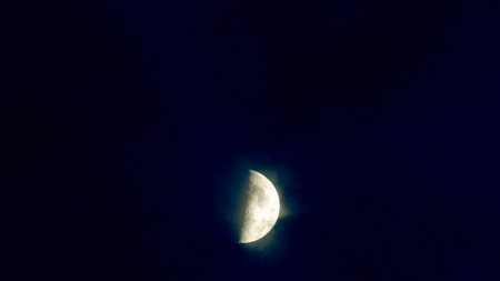 Mysterious Moon in Fog In sky Night Clouds Not Full Moon Ambience and Fabulousness.の写真素材
