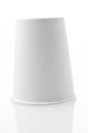 White cardboard cups on white background, blank for mockup design.の写真素材