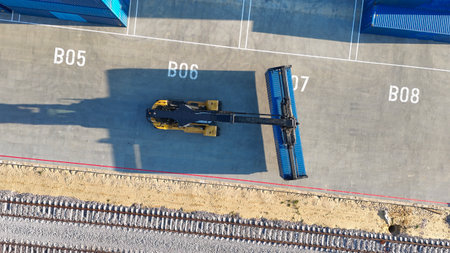 The process of loading and unloading on a forklift, placing boxes in a stack in the logistics area,...