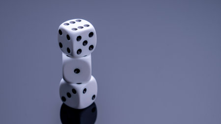 Dice on a mirrored background, concept. High quality photo