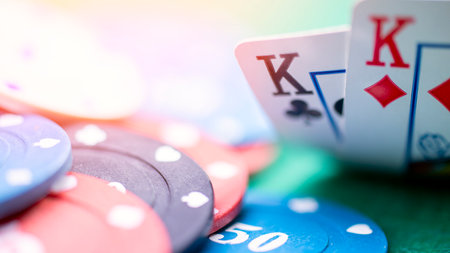 The hands hold cards that spell out the word WIN with chips, betting, poker, blackjack, or Texas Hold Em. High quality photoの写真素材