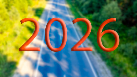 2026 figures on the road in the forest, the concept of travel, recreation and the new year of 2026....