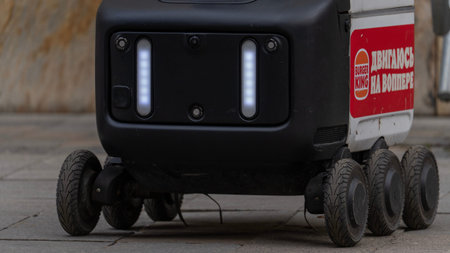 Moscow November 04 2025, Delivery robot wheels. Close-up of a delivery robot on a city street. High quality photoのeditorial素材