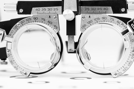 Optometry testing equipment. Optometry testing equipment display with lenses and prisms. High...