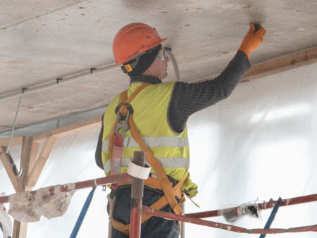 Moscow, November 20 2025, Construction worker scaffolding. High quality photo