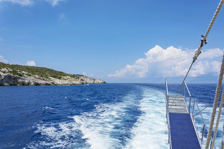 Ship gangway cash followed by a marine vesselの写真素材