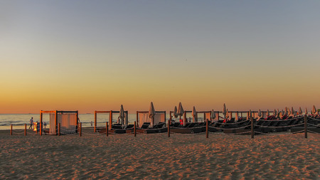 Beach in the evening sunsetの写真素材