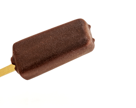 Ice cream with ice cream in a chocolate glaze on a stick on a white backgroundの写真素材