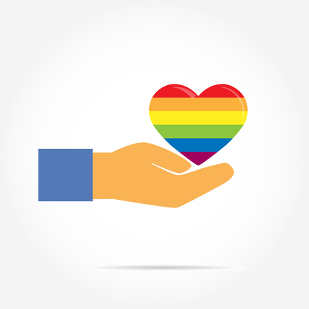Hand supports the silhouette of a heart in the colors of LGBT, flat designのイラスト素材