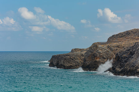 Seascape. The rocky coast of their cloud in the sky. Stock photographyの写真素材