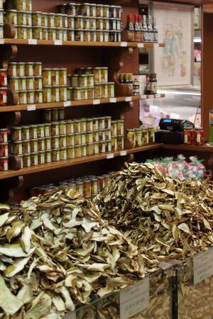 An italian shop with a table full of porcini mushroomsの写真素材