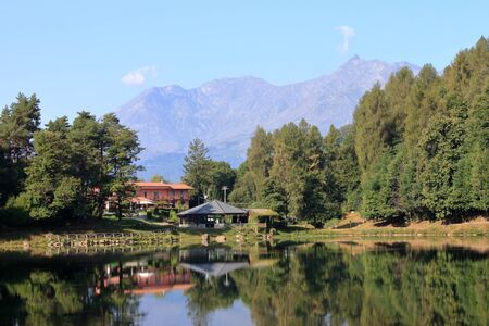 Autumn 2019: classic panorama of an alpine lake in a valley of morainic origin, Italian Alps in Piedmont regionの写真素材