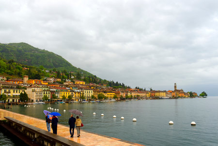 Salo city, Italy - 25 april 2022: panoramic view of the promenade on Lake Gardaのeditorial素材