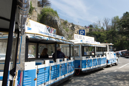 San Marino, april 4, 2023 - Tourist train through the streets of San Marino, Europeのeditorial素材