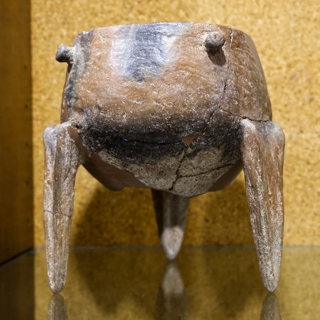 Cagliari, Italy - 11 Jan 2024: Tripod pot with conic bulges and perforated carenaのeditorial素材