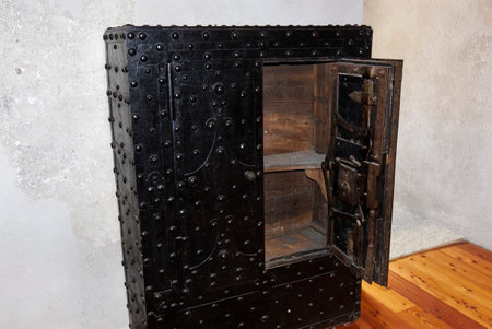 an old safe made of wood and wrought ironの写真素材