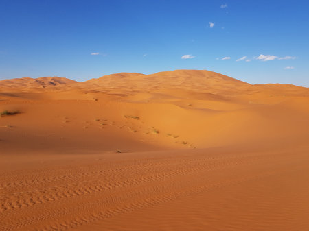 Desert landscape with mountains and a beautiful blue skyの写真素材