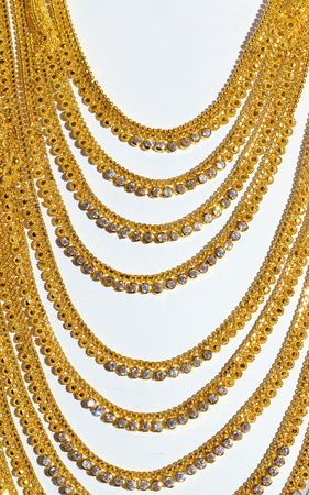 Golden necklace decorated with diamondsの写真素材