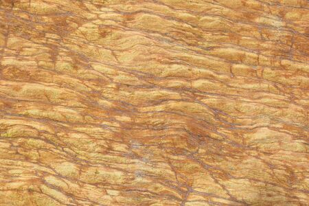 Detail of colorful sandstone surface as abstract background