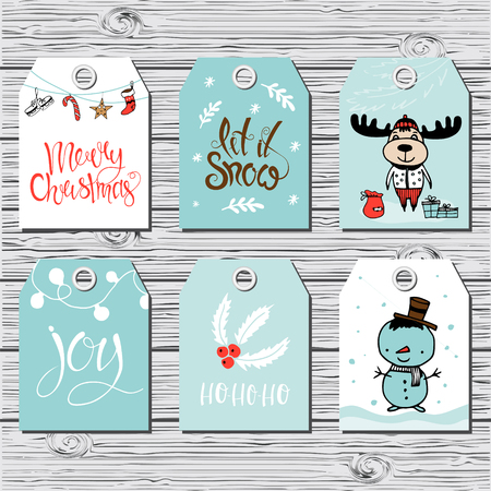 Set of six vector holiday Christmas tags with cartoon characters deer, snowman and holiday calligraphy.のイラスト素材