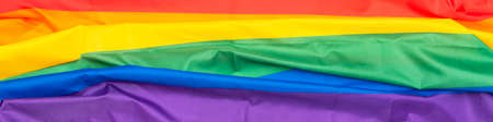 Rainbow textile flag, LGBT flag, fabric gay, lesbian flag as background or textureの写真素材