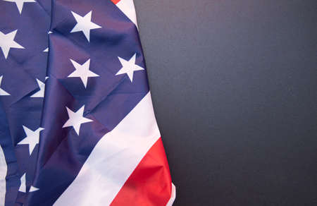 Fabric USA flag and black board as background, for textの写真素材