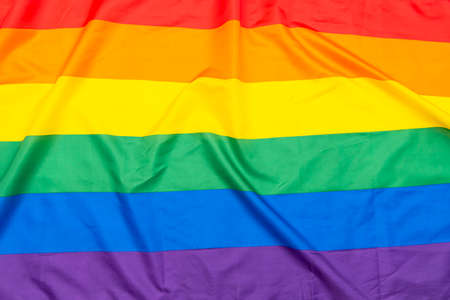 Rainbow textile flag, LGBT flag, fabric gay, lesbian flag as background or textureの写真素材