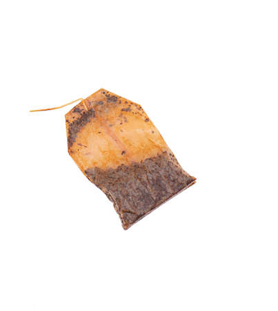 Used tea bag, dirty teabag with string, isolated on white background, tip viewの写真素材
