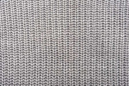 Seamless pattern of knitted warm winter sweater, close-up textureの写真素材