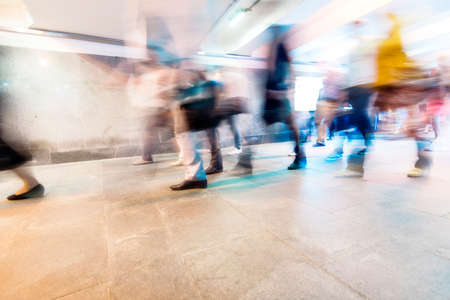 Crowd of People as Pedestrians in Metro, blurred Picture as Backgroundの写真素材