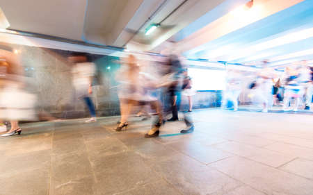Crowd of People as Pedestrians in Metro, blurred Picture as Backgroundの写真素材