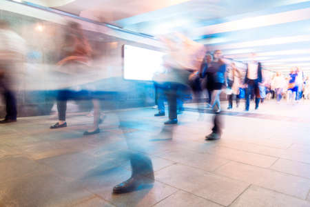 Crowd of People as Pedestrians in Metro, blurred Picture as Backgroundの写真素材
