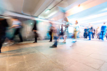 Crowd of People as Pedestrians in Metro, blurred Picture as Backgroundの写真素材