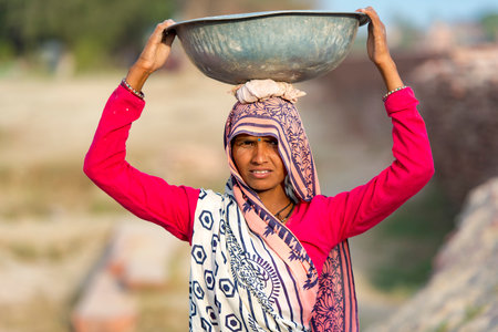 AGRA - FEB 28: Indian Woman Worker in Agra on February 28.2018 in Indiaのeditorial素材