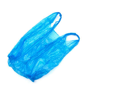 Used plastic blue bag isolated on white. Crumpled recycle bag.の写真素材