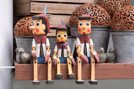 MOSCOW - JUL3: Wooden Pinocchio dolls as souvenir toy in Moscow, July 03.2020 in Russia