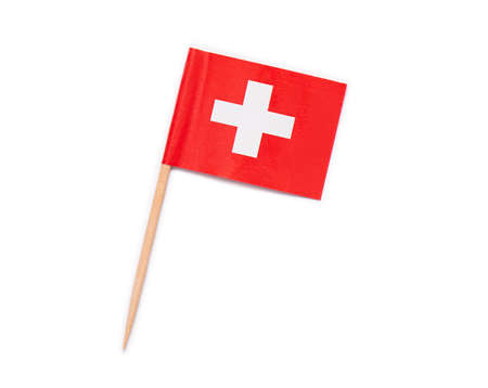 Paper flag of Switzerland on wooden toothpick isolated on whiteの写真素材