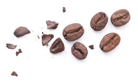 Broken roasted coffee bean with crumbs isolated on white backgroundの写真素材