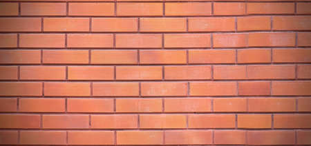 Brown brick wall, clean smooth blank surface, long picture as backgroundの写真素材