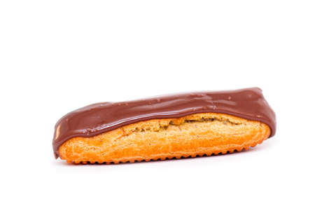 French Eclair with Chocolate brown Glaze. Eclairs with Custard isolated on white Background, top Viewの写真素材