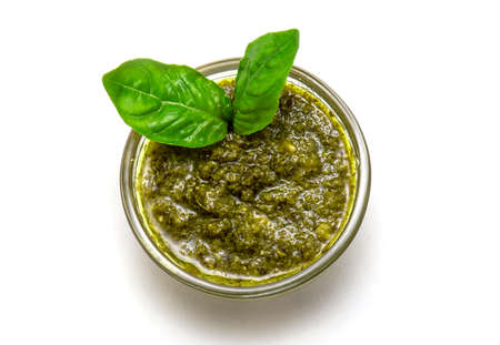 Top View of Italian Sauce Pesto or bowl of Basil Pesto isolated on white Backgroundの写真素材