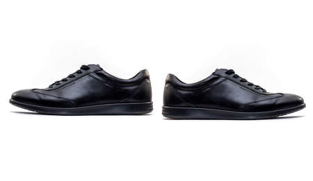 Two black Man Shoe or Boot isolated on white Backgroundの写真素材