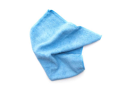 Blue kitchen rug isolated on white. Crumpled used micrifibre cloth clean, top view.の写真素材