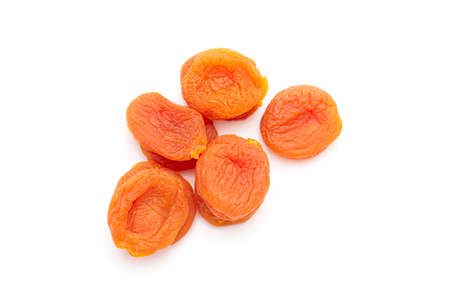 Dried apricots isolated on white, top viewの写真素材
