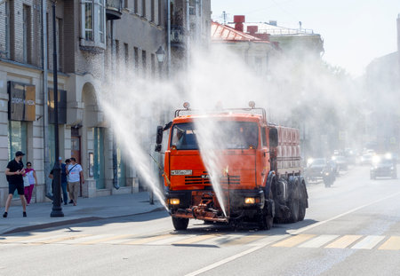MOSCOW - JUL 20: Modern street flusher machine KAMAZ in a street of Moscow during hot summer day, July 20. 2021 in Russiaのeditorial素材