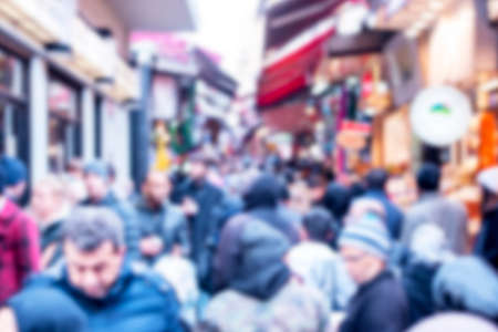 Crowd of people at the Istanbul market, defocused, blurred picture of turkish people in a street as backgroundの写真素材