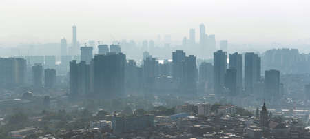Large panoramic picture of Seoul with skyscrapers construction in the morning. Air pollution, bad ecologia over Seoul in South Korea.の写真素材