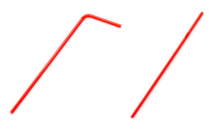Two classic red cocktail straws isolated on whiteの写真素材