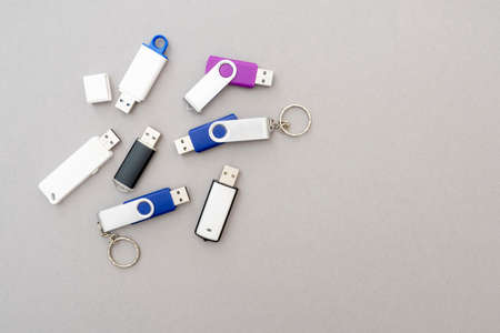 Heap of an old used USB flash drives, top view