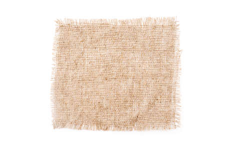 Square piece of beige canvas, sackcloth isolated on whiteの写真素材